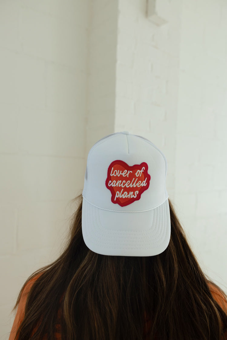 LOVER OF CANCELLED PLANS TRUCKER HAT